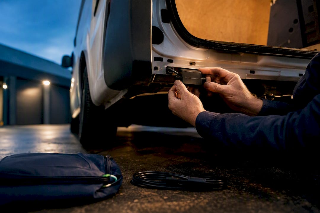 Installer fitting anonymous van tracking module